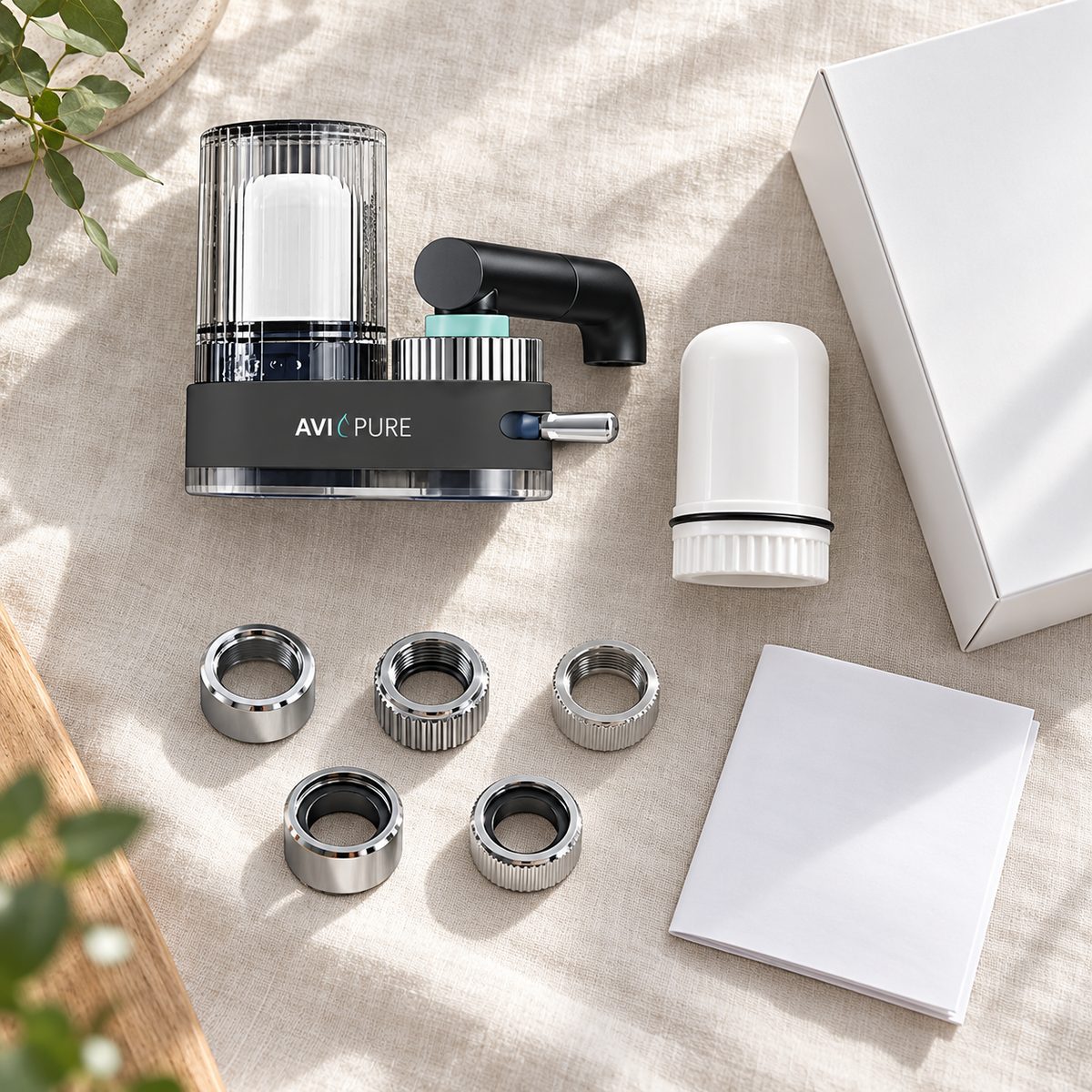 AviaPure unit, spare cartridge, five adapter rings, guide and box laid out